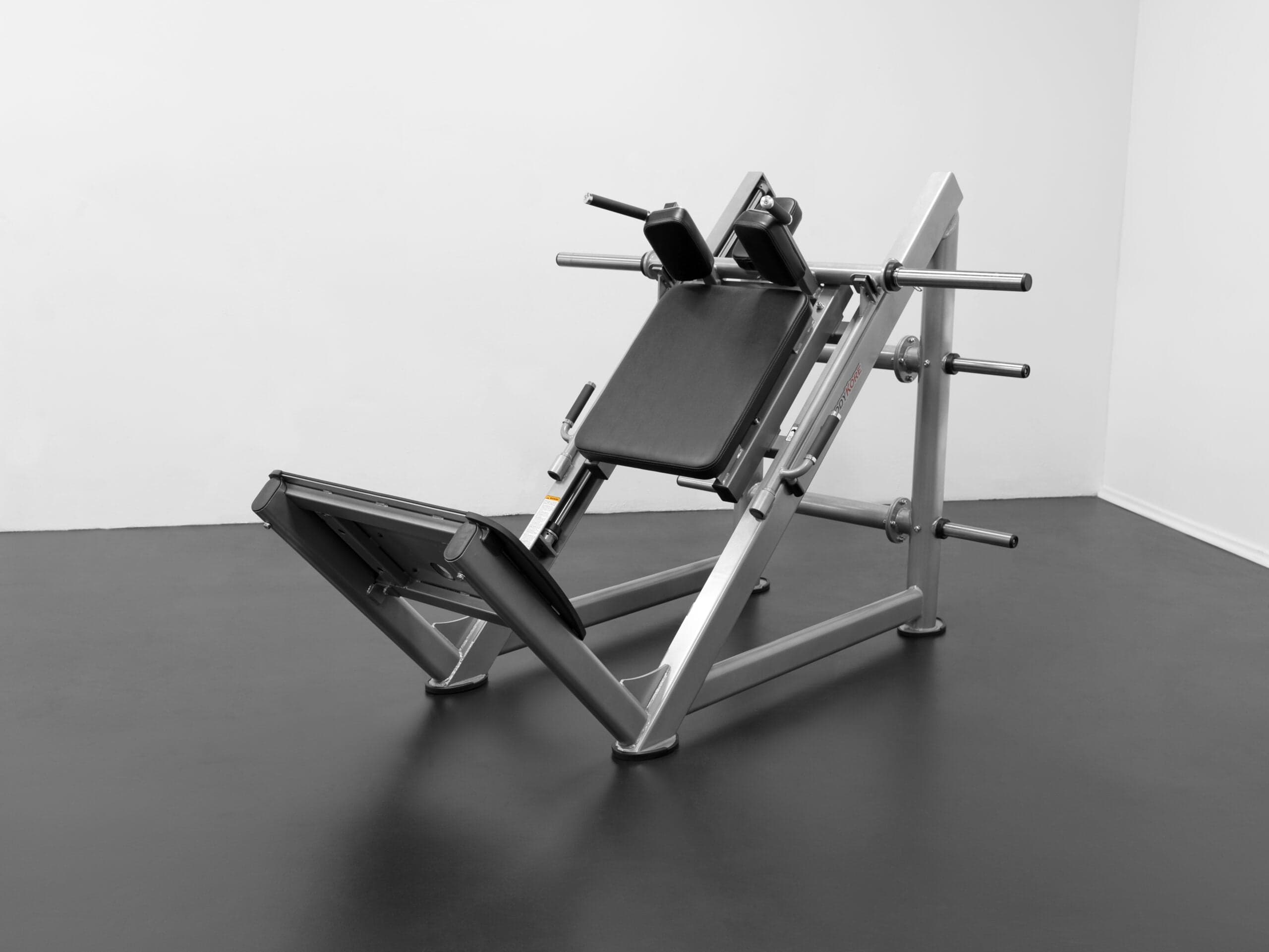 Hack Squat: How to Do Them, Proper Form Tips, and Variations
